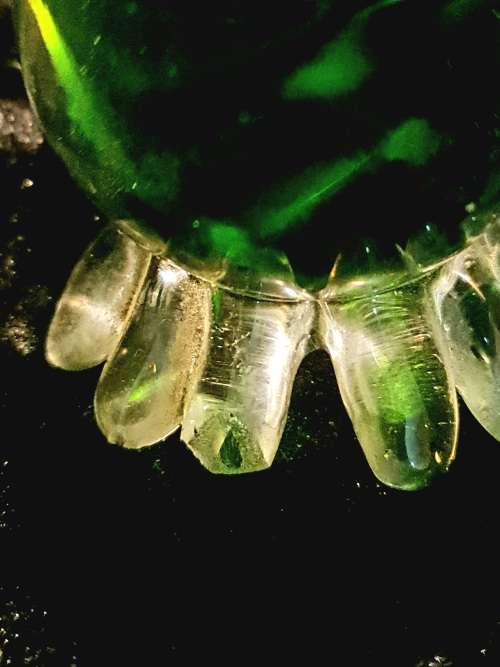 Heavy vintage green glass duck.