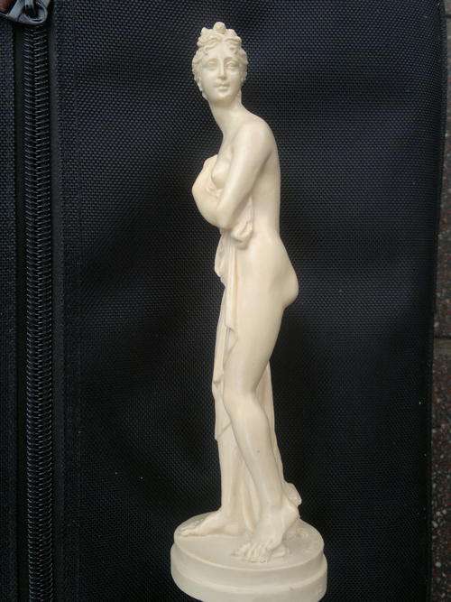 An A Santini sculpture of a lady with beautiful detail