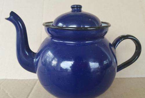 Blue enamel kettle made in Poland marked no.14.