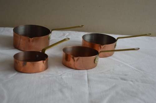 OLD FUNCTIONAL COPPER MEASURING CUPS