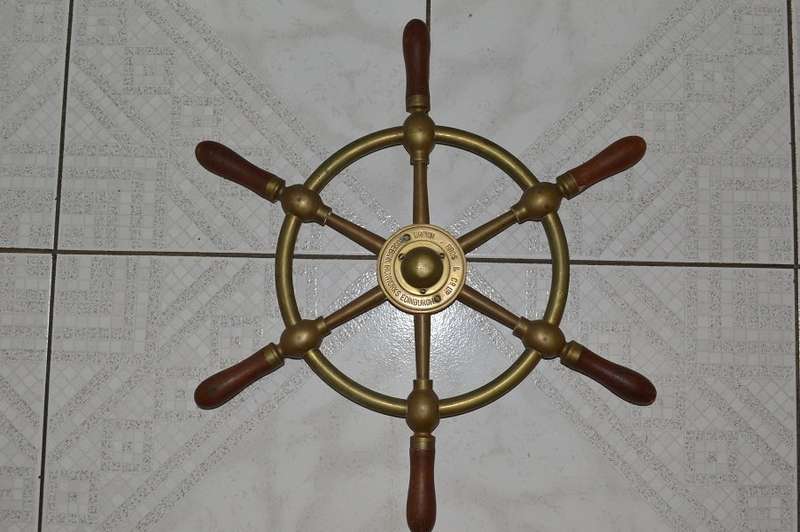 A brass ships wheel marked Brown Brothers & Co. Ltd, Rosebank Iron Works Edinburgh