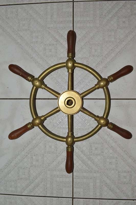 A brass ships wheel marked Brown Brothers & Co. Ltd, Rosebank Iron Works Edinburgh