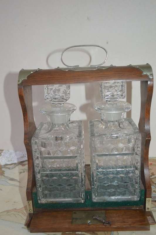 Beautiful 2 bottle oak  tantalus with original key