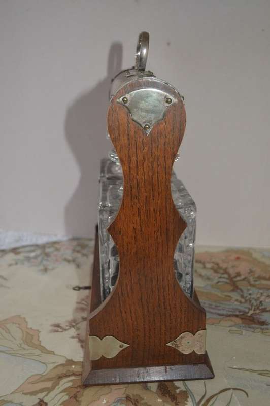 Beautiful 2 bottle oak  tantalus with original key