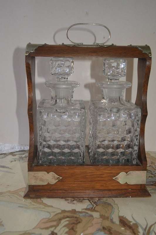 Beautiful 2 bottle oak  tantalus with original key