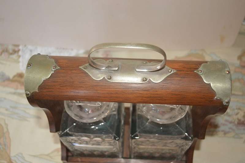Beautiful 2 bottle oak  tantalus with original key
