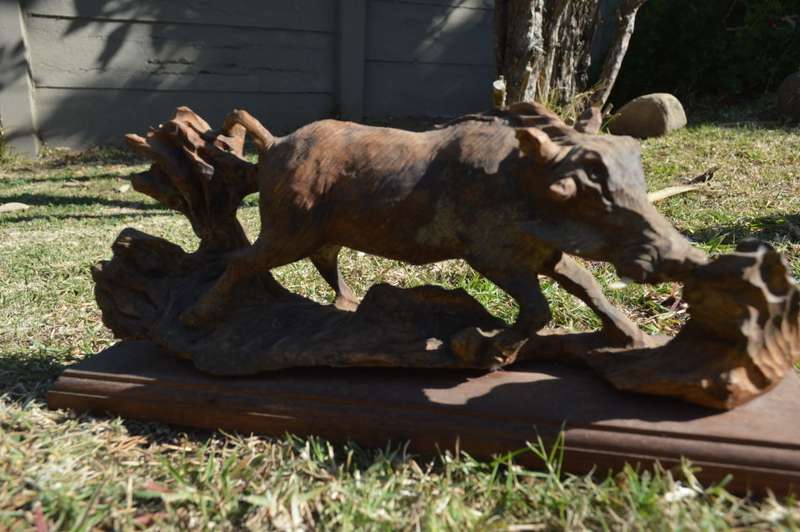Very large from the 80's ironwood carved buffalo of rosewood base