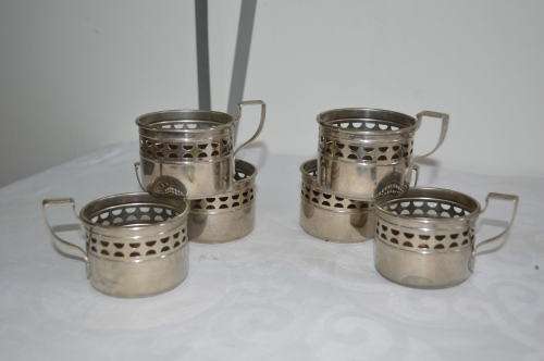 stamped M Fg with an ostritch 6 metal cup holders art deco