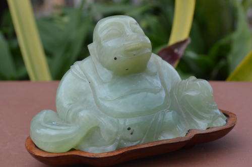 Chinese jade stone laughing buddha on wood base