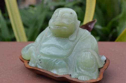 Chinese jade stone laughing buddha on wood base