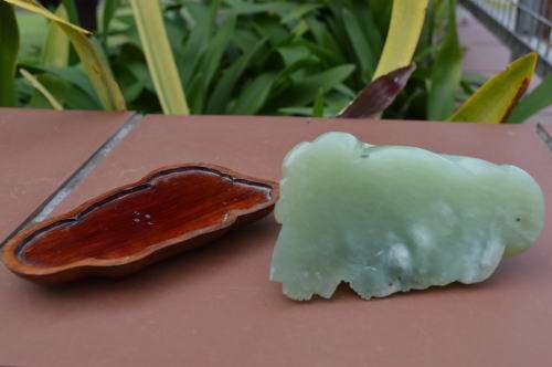 Chinese jade stone laughing buddha on wood base
