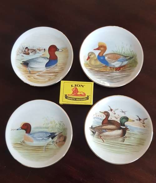 set of 4 bird plates lovely