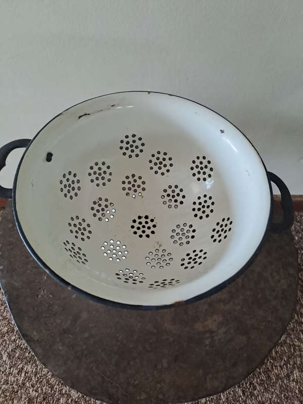 Genuine old enamel colander