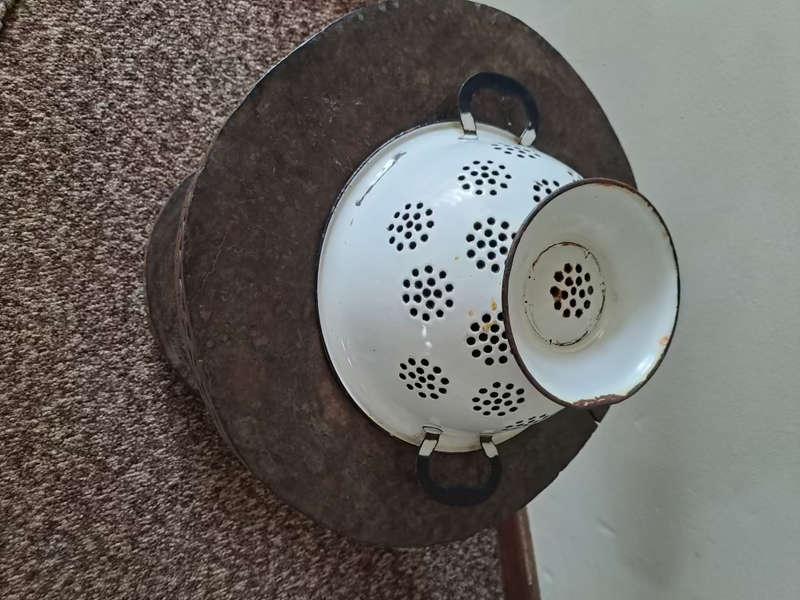 Genuine old enamel colander