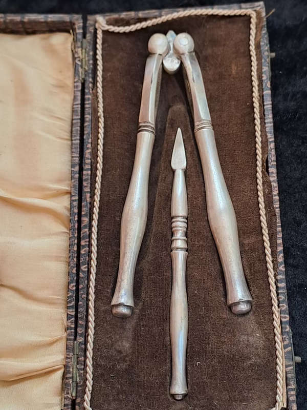 Antique silver plated nutcracker and punch set