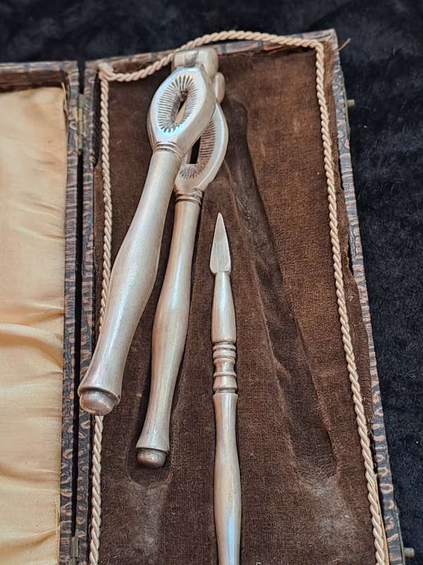 Antique silver plated nutcracker and punch set