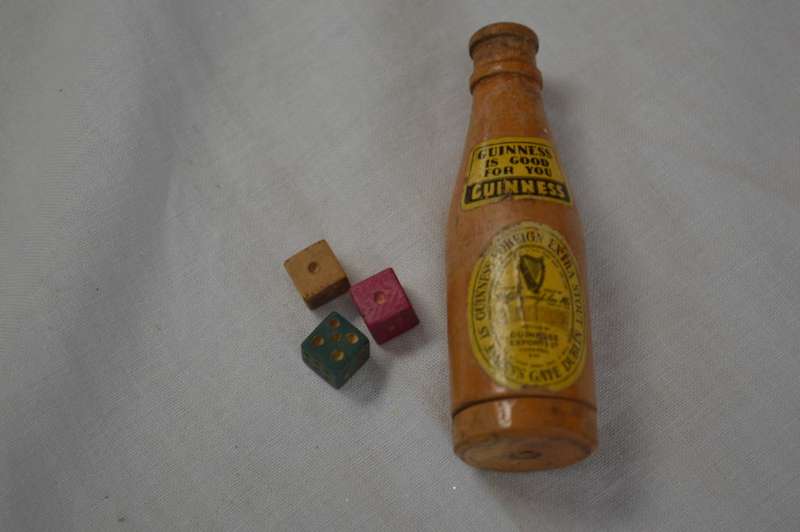 7cm miniature  Guiness wooden bottle with 3 tiny die