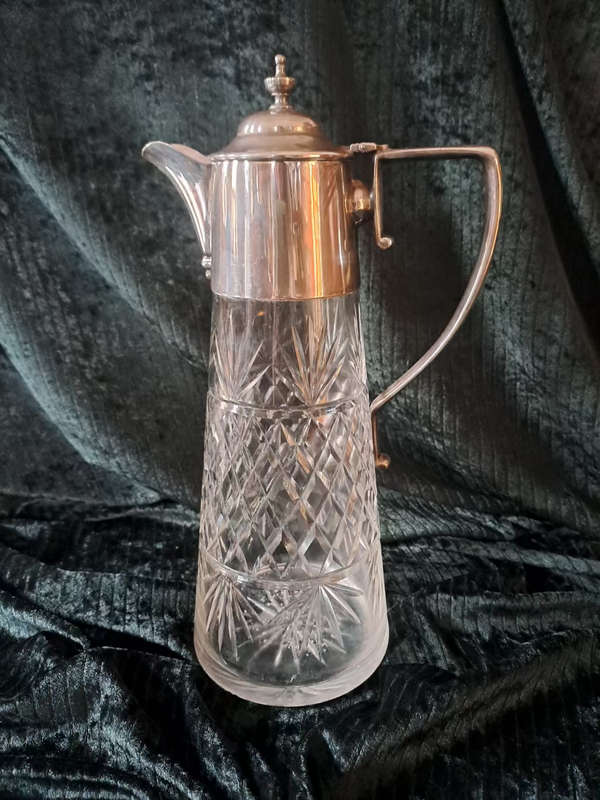 Beautiful early 1900`s cut glass crystal Claret jug with silver plate mountings