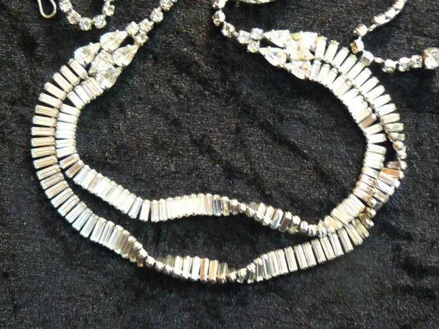 TWISTED DOUBLE STRAND SILVERTONED NCKLACE...WITH BLING 49 CM LONG VERY INTERESTING !!!!!