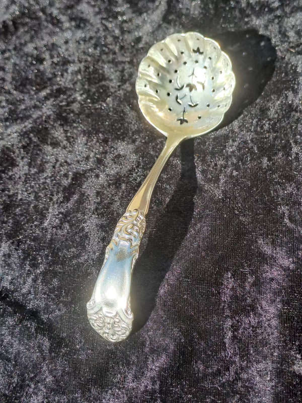 Epns Hallmarked sugar sifter beautiful