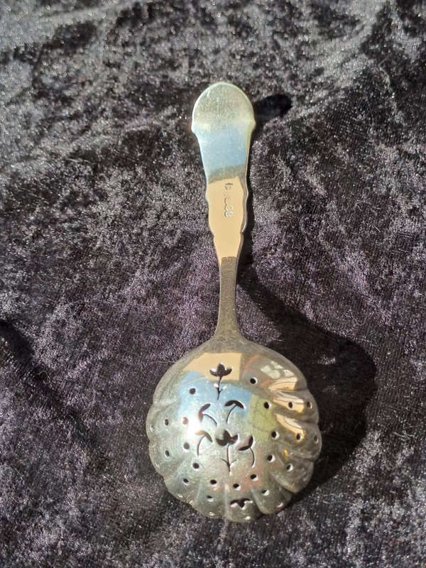 Epns Hallmarked sugar sifter beautiful
