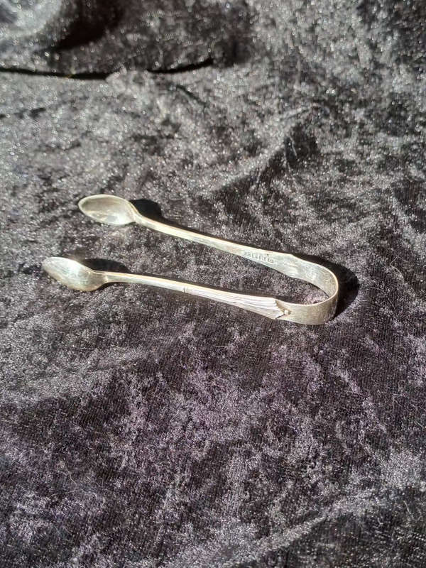 Very pretty epns sugar tongs nice condition