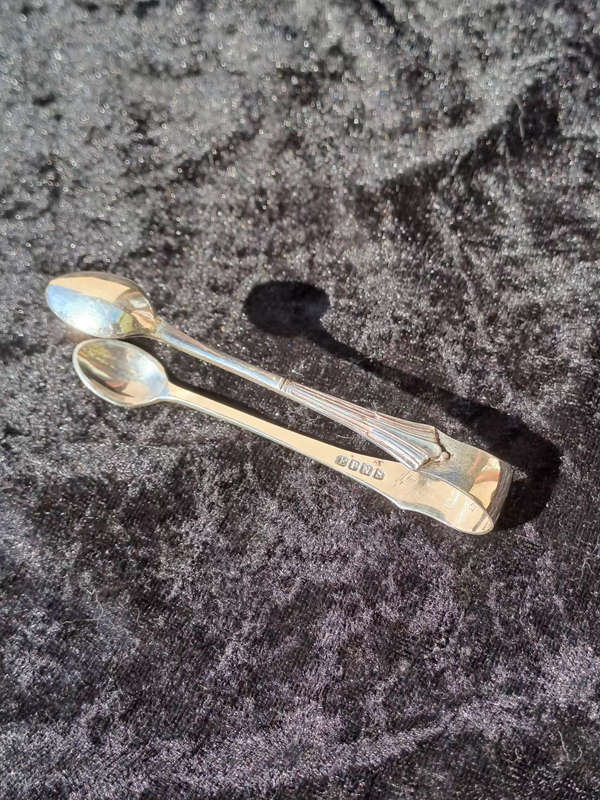 Very pretty epns sugar tongs nice condition