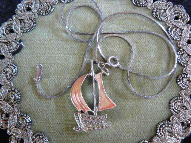 SAIL SHIP PENDANT AND SILVER TONED CHAIN