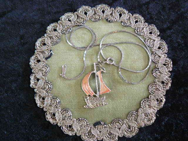 SAIL SHIP PENDANT AND SILVER TONED CHAIN