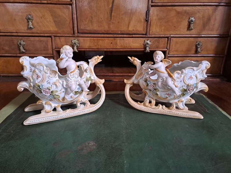 Fabulous Pair of vintage German bisque cherubs on sleighs center piece