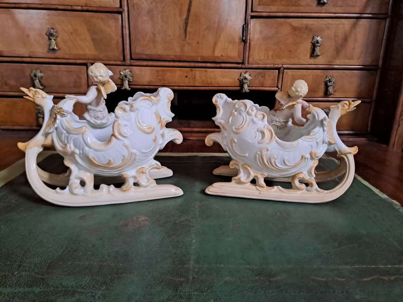 Fabulous Pair of vintage German bisque cherubs on sleighs center piece