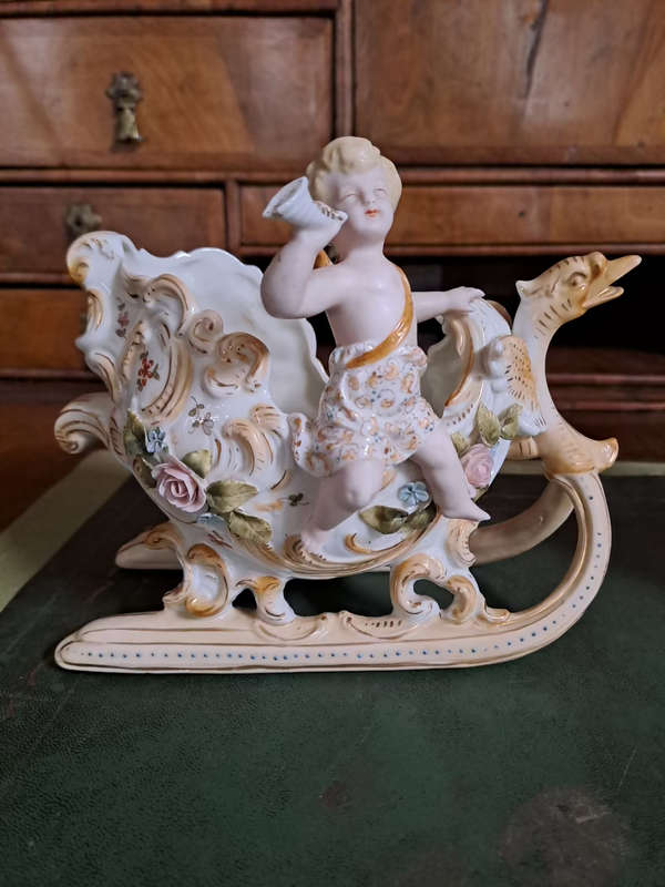 Fabulous Pair of vintage German bisque cherubs on sleighs center piece