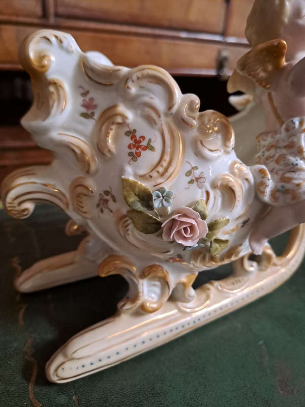 Fabulous Pair of vintage German bisque cherubs on sleighs center piece