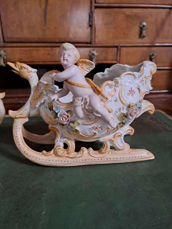 Fabulous Pair of vintage German bisque cherubs on sleighs center piece