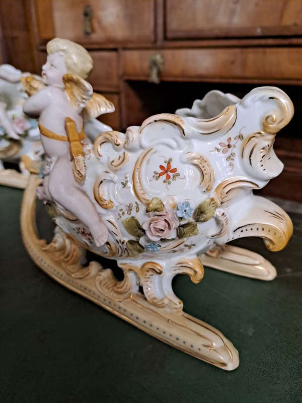 Fabulous Pair of vintage German bisque cherubs on sleighs center piece