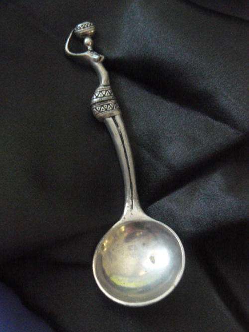 SILVER COLOURED SUGAR SPOON SIGNED
