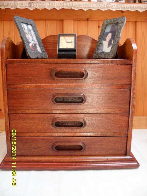 Rose wood table top chest of draws