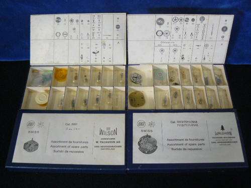 ASSORTED SWISS WATCH SPARES 2 BOXES FULL NEVER BEEN USED