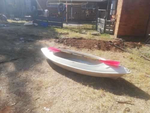Canoe and spores and life jacket.Pick up only.