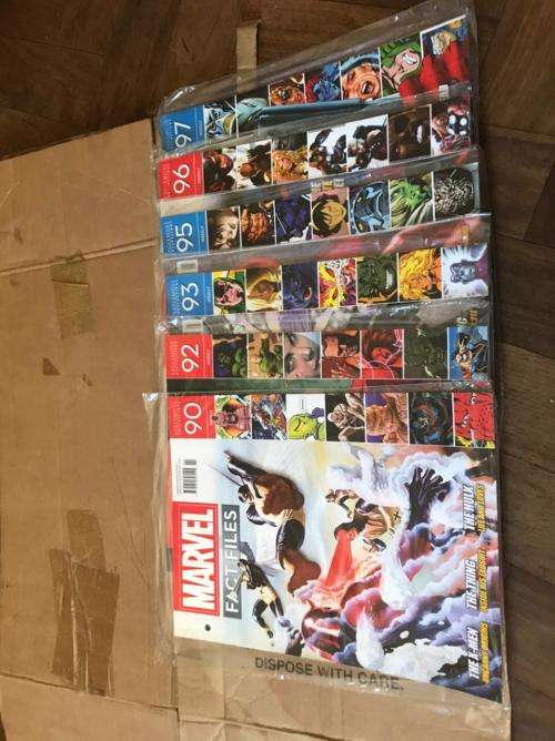 68 x Marvel Fact files and 1 folder as per pictures-All Sealed in plastic