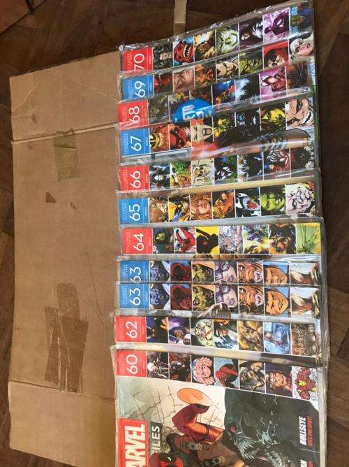 68 x Marvel Fact files and 1 folder as per pictures-All Sealed in plastic