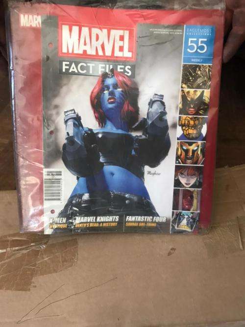 68 x Marvel Fact files and 1 folder as per pictures-All Sealed in plastic