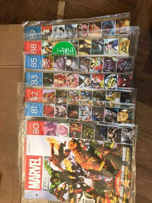 68 x Marvel Fact files and 1 folder as per pictures-All Sealed in plastic