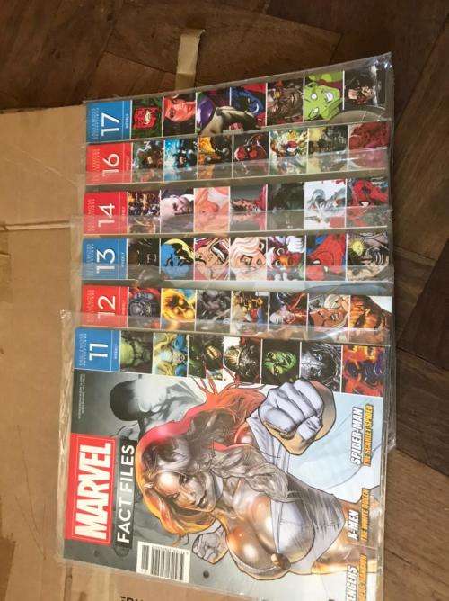 68 x Marvel Fact files and 1 folder as per pictures-All Sealed in plastic