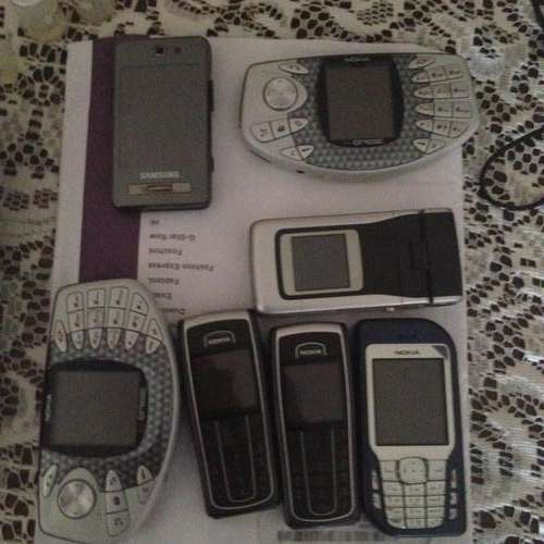 Box of cellphones Nokias and samsung