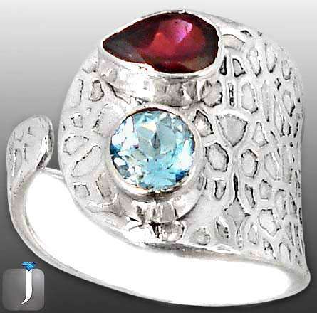 Gorgeous Solid Silver Garnet and Blue Topaz size 8 (adjustable) ring