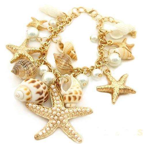 Beautifull Costume Jewellery Gold tone shell and pearl bracelet.