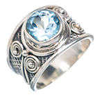 Gorgeous Solid Silver and Blue Topaz size 7 ring