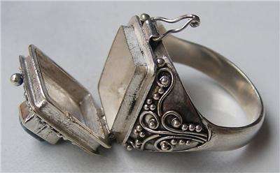 Exquisite 925 Sterling Silver & Garnet poison Ring...