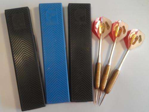 unicorn dart board with cabinet and darts